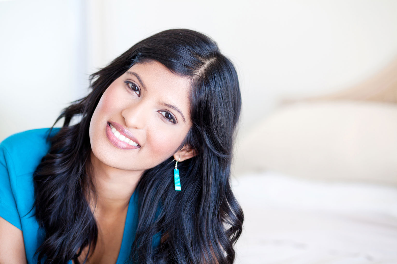 woman with a bright smile | Newton Village Dental Clinic